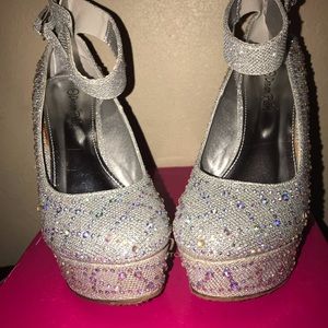 5in. silver glittery wedges size 7.